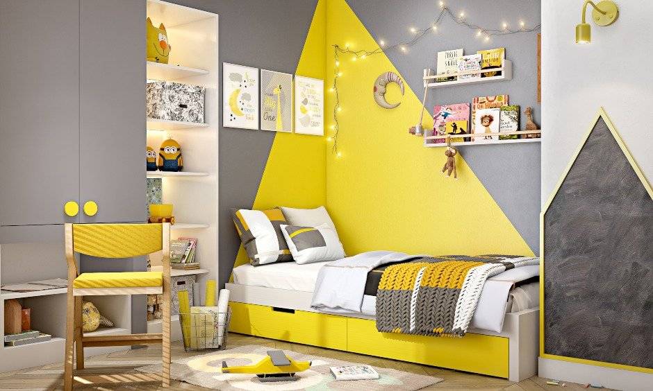 kids bedroom design with grey coloured wardrobe and attached study unit